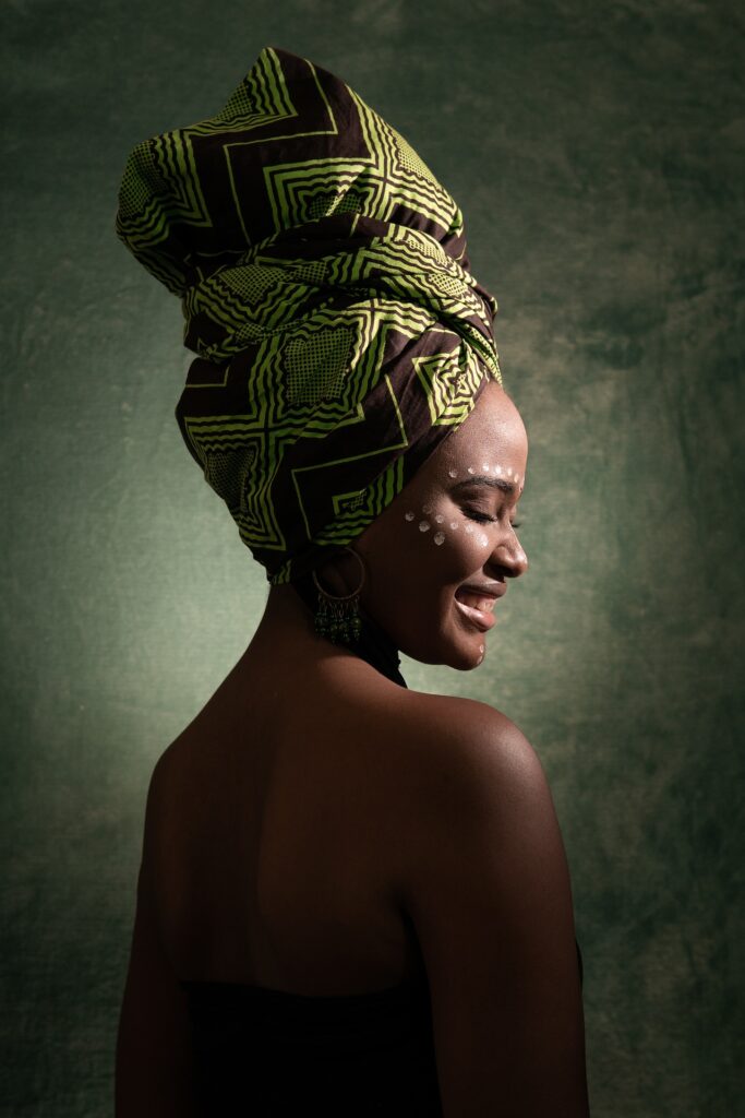 African woman wearing green head wrap