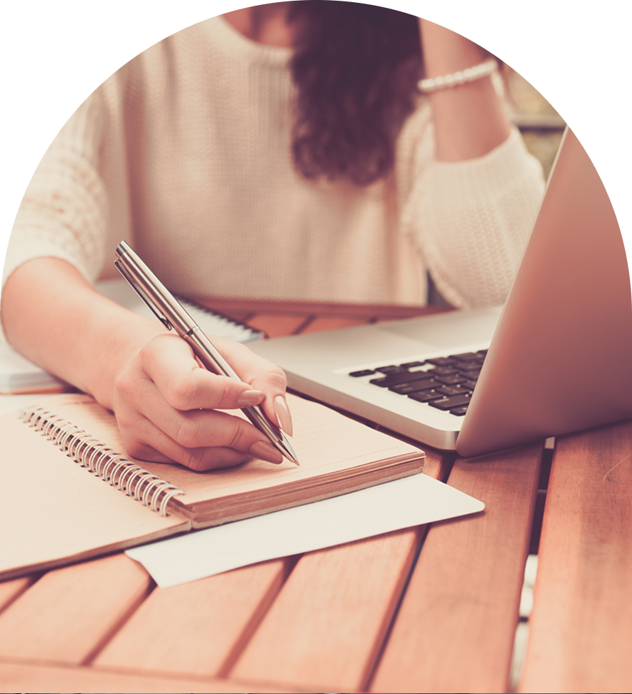 Woman writing in a notebook